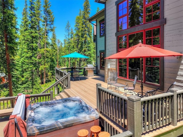 366 Moonstone Rd, Breckenridge, CO 80424 - deck with a hot tub and outdoor dining space