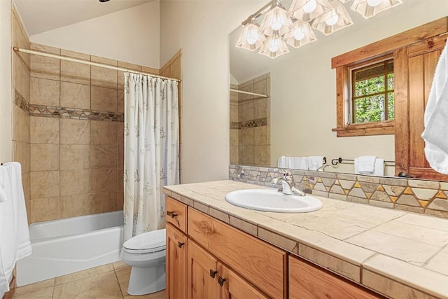366 Moonstone Rd, Breckenridge, CO 80424 - bathroom with a chandelier, vanity, shower / bath combo with shower curtain, lofted ceiling, and tile patterned floors