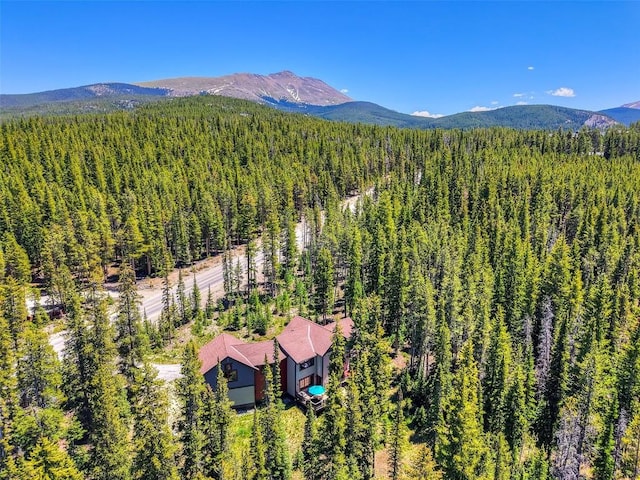 366 Moonstone Rd, Breckenridge, CO 80424 - view from above of property featuring a heavily wooded area and a mountain backdrop