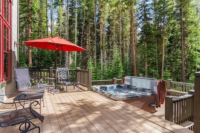 366 Moonstone Rd, Breckenridge, CO 80424 - wooden deck with a covered hot tub and a forest view