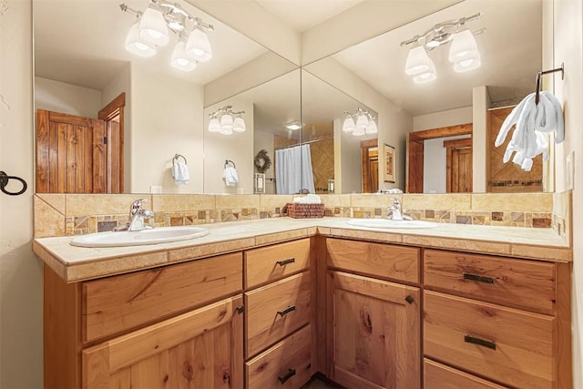 366 Moonstone Rd, Breckenridge, CO 80424 - bathroom featuring backsplash, double vanity, and curtained shower