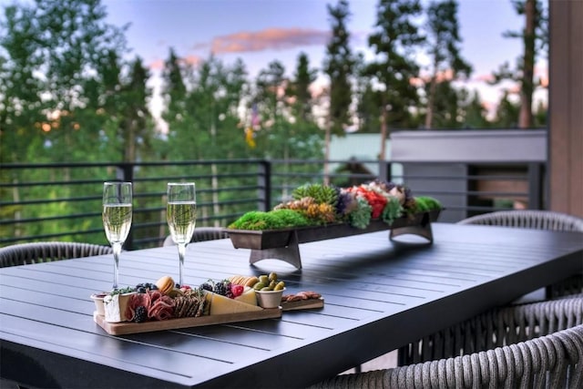 view of balcony at dusk