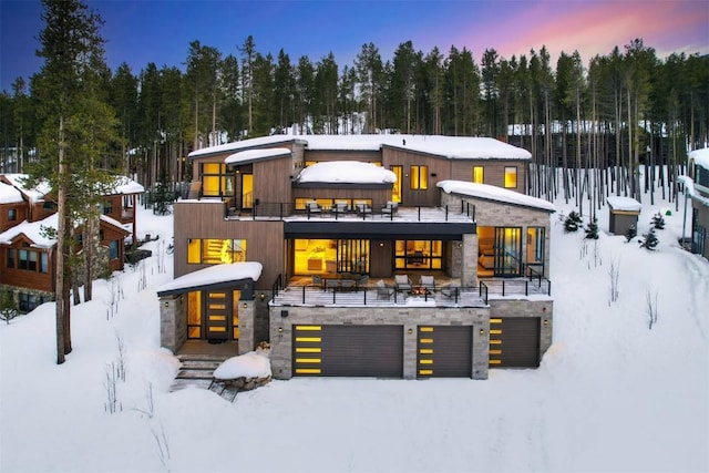 view of snow covered house