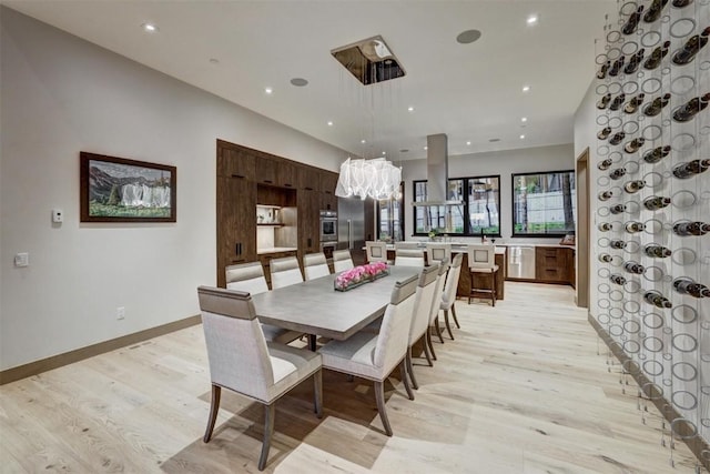 dining room with light hardwood / wood-style floors