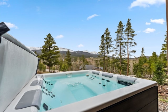 1009 American Way, Breckenridge, CO 80424 - view of pool featuring a hot tub and a mountain view
