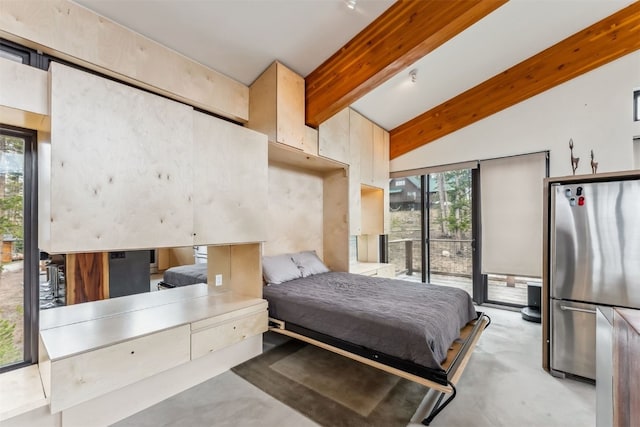 1009 American Way, Breckenridge, CO 80424 - bedroom with freestanding refrigerator and finished concrete flooring