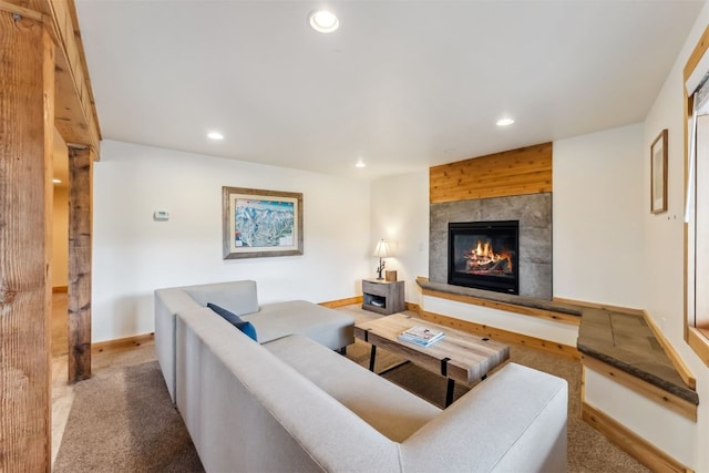 1009 American Way, Breckenridge, CO 80424 - carpeted living room with recessed lighting, a tiled fireplace, and baseboards
