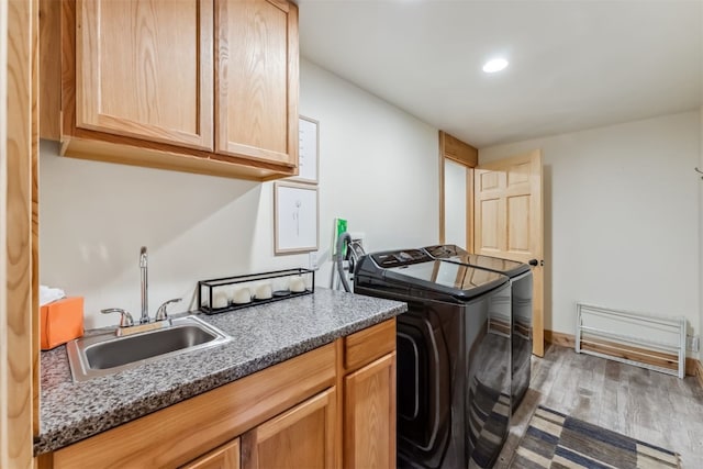 1009 American Way, Breckenridge, CO 80424 - laundry room featuring washing machine and clothes dryer, cabinet space, wood finished floors, and recessed lighting