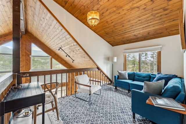 1009 American Way, Breckenridge, CO 80424 - living room with wood ceiling, plenty of natural light, a chandelier, and carpet