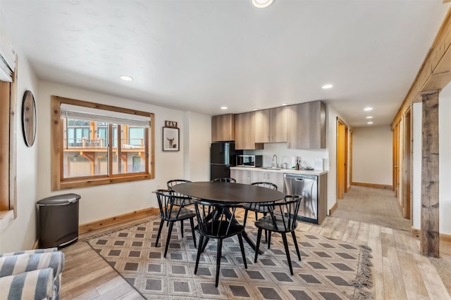 1009 American Way, Breckenridge, CO 80424 - dining area featuring baseboards, light wood-style flooring, and recessed lighting