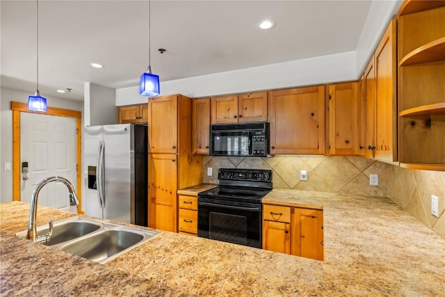 435 Ore House Plz Unit 202, Steamboat Springs, CO 80487 - kitchen with black appliances, a sink, pendant lighting, tasteful backsplash, and recessed lighting