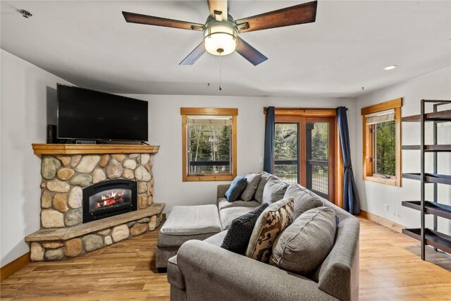 435 Ore House Plz Unit 202, Steamboat Springs, CO 80487 - living area with wood finished floors, healthy amount of natural light, and baseboards