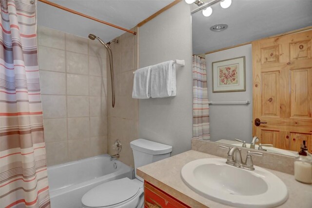 1805 River Queen Ln Unit 201, Steamboat Springs, CO 80487 - full bath with shower / bath combo with shower curtain, vanity, and toilet