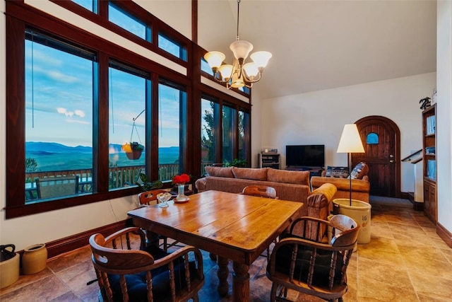 1023 Raven Way, Como, CO 80432 - dining area featuring a high ceiling and a chandelier