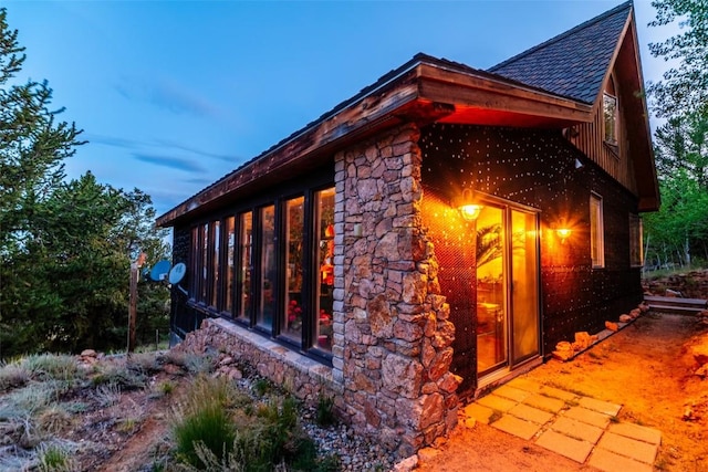 1023 Raven Way, Como, CO 80432 - property exterior at dusk featuring a shingled roof