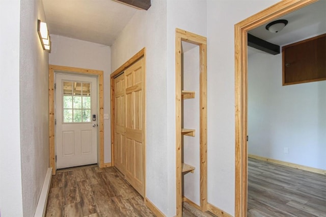 338 Deer Path Rd, Dillon, CO 80435 - doorway to outside featuring wood finished floors and baseboards