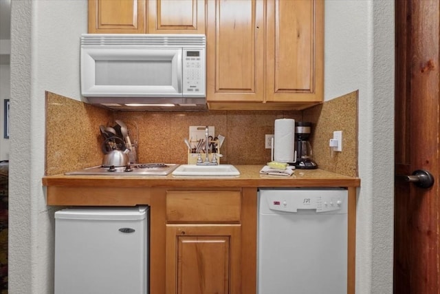 655 Four Oclock Rd Unit 209, Breckenridge, CO 80424 - kitchen featuring white appliances, backsplash, and light countertops
