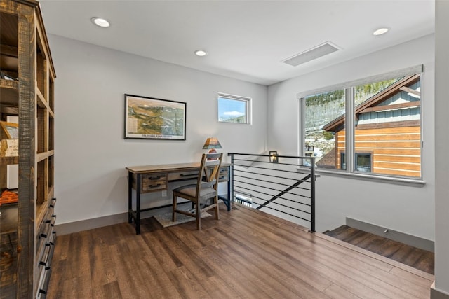 home office featuring recessed lighting, wood finished floors, and baseboards