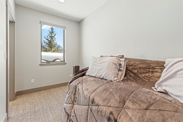 carpeted bedroom with baseboards and recessed lighting