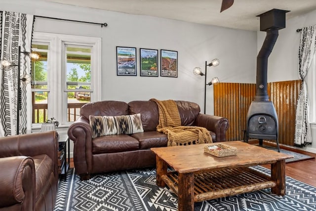 200 N Grant Ave, Oak Creek, CO 80467 - living area with a wood stove and wood finished floors