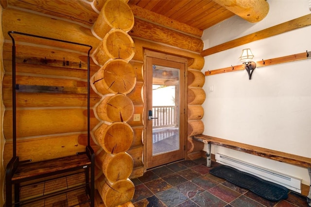 57640 County Road 129, Clark, CO 80428 - mudroom with a baseboard heating unit, stone tile floors, wooden ceiling, and rustic walls