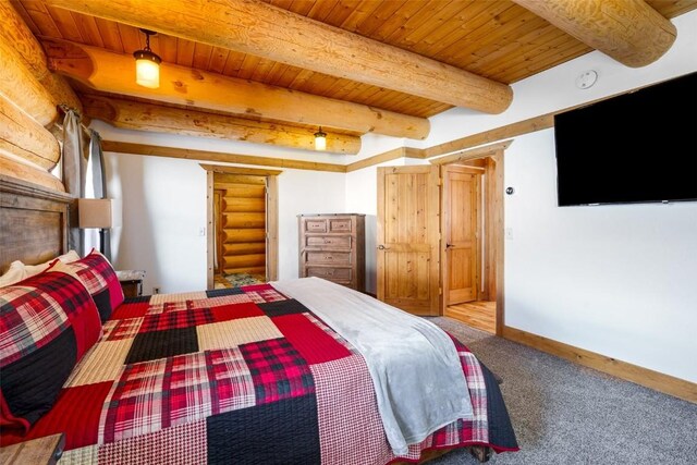 57640 County Road 129, Clark, CO 80428 - bedroom with a wood ceiling with exposed beams and carpet floors