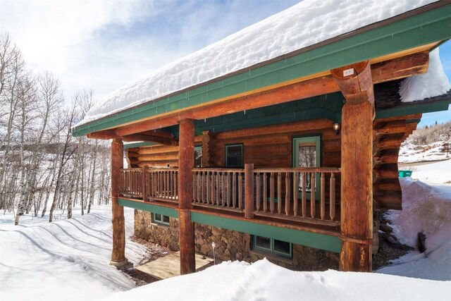 57640 County Road 129, Clark, CO 80428 - view of snow covered exterior featuring log exterior