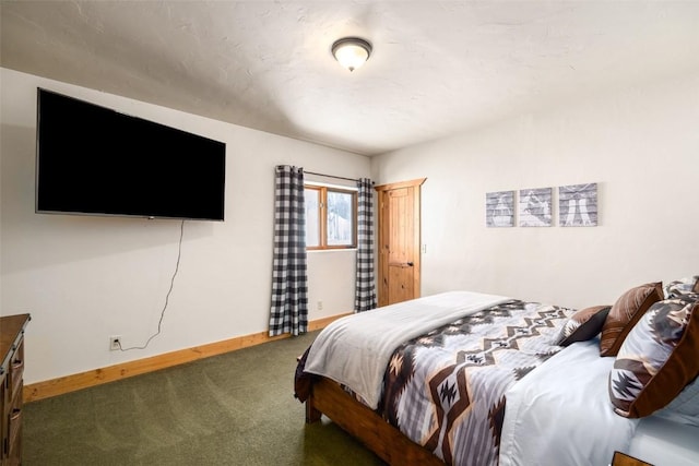 57640 County Road 129, Clark, CO 80428 - carpeted bedroom featuring baseboards