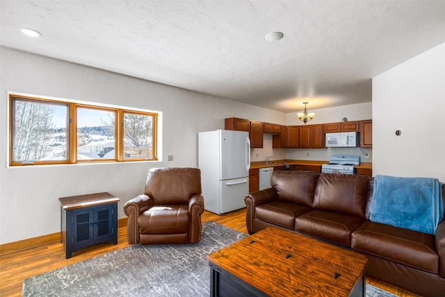 57640 County Road 129, Clark, CO 80428 - living room with a chandelier and wood finished floors