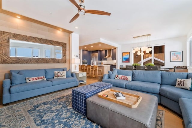 living room with ceiling fan