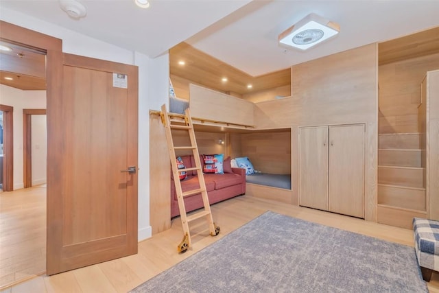 bedroom with wood-type flooring