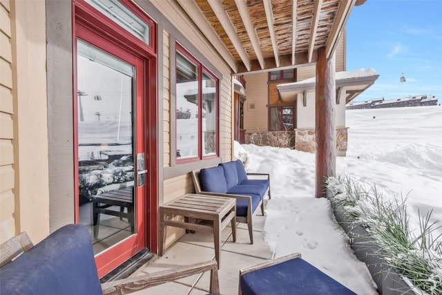 view of snow covered patio