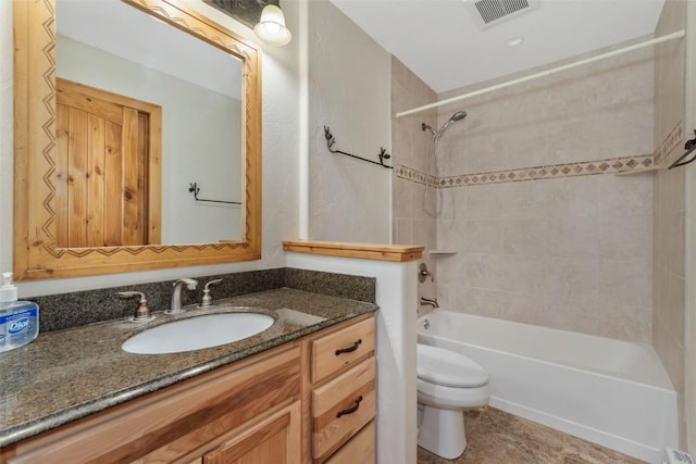 23015 Schussmark Trl Unit C, Oak Creek, CO 80467 - bathroom featuring vanity and washtub / shower combination