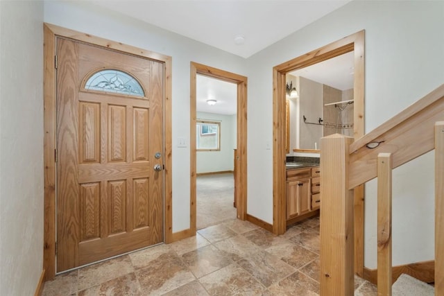 23015 Schussmark Trl Unit C, Oak Creek, CO 80467 - entrance foyer with baseboards and light stone finish floors