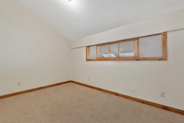 23015 Schussmark Trl Unit C, Oak Creek, CO 80467 - empty room with carpet flooring and lofted ceiling