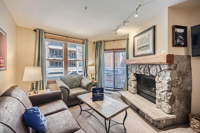 100 Dercum Sq Unit 8343, Keystone, CO 80435 - living area with carpet floors, track lighting, and a fireplace