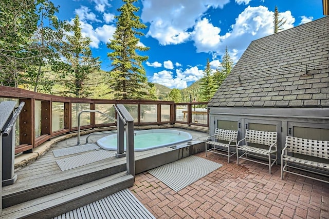 100 Dercum Sq Unit 8343, Keystone, CO 80435 - deck featuring an outdoor hot tub and a mountain view