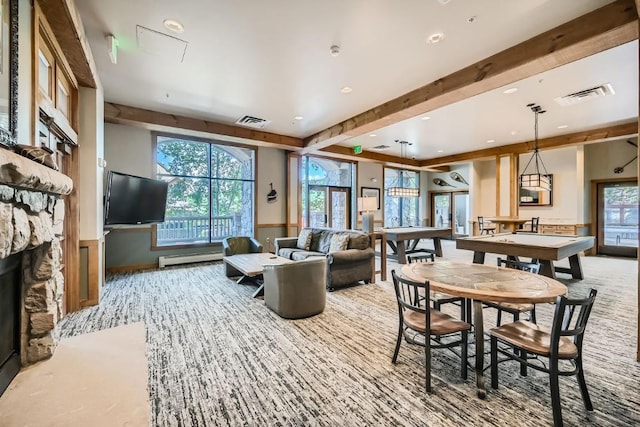 100 Dercum Sq Unit 8343, Keystone, CO 80435 - interior space featuring a baseboard heating unit, plenty of natural light, visible vents, and beam ceiling