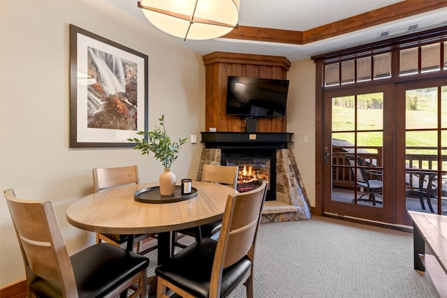 1521 Ski Hill Rd Unit 8313, Breckenridge, CO 80424 - carpeted dining room with a fireplace