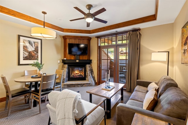 1521 Ski Hill Rd Unit 8313, Breckenridge, CO 80424 - carpeted living room with a raised ceiling, a fireplace, and ceiling fan