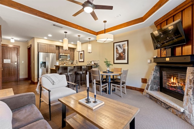 1521 Ski Hill Rd Unit 8313, Breckenridge, CO 80424 - living area with ceiling fan, a stone fireplace, recessed lighting, and carpet floors