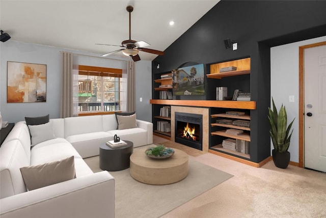 3335 Columbine Dr Unit 907, Steamboat Springs, CO 80487 - living room featuring vaulted ceiling, a ceiling fan, a tiled fireplace, carpet, and recessed lighting