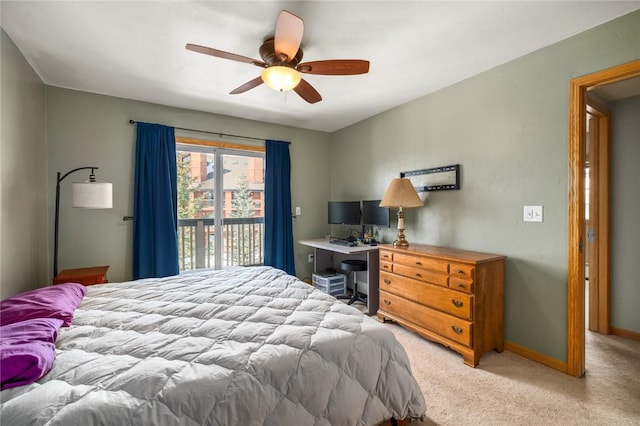 3335 Columbine Dr Unit 907, Steamboat Springs, CO 80487 - bedroom featuring baseboards, access to exterior, light colored carpet, and ceiling fan