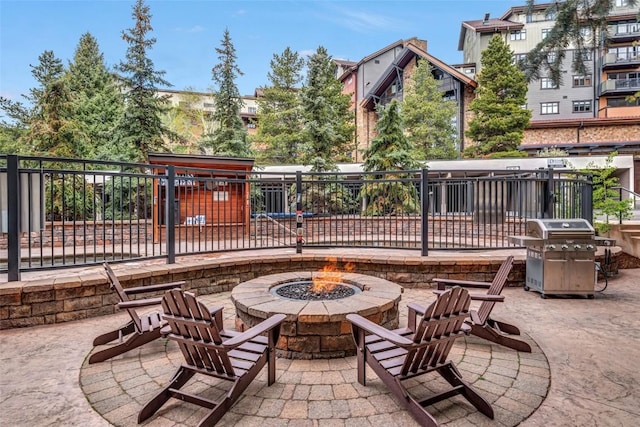 2286 Apres Ski Way Unit 105, Steamboat Springs, CO 80477 - view of patio / terrace featuring a fire pit and area for grilling