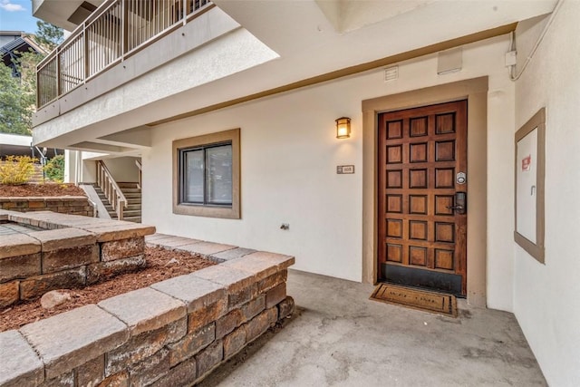2286 Apres Ski Way Unit 105, Steamboat Springs, CO 80477 - doorway to property featuring stucco siding
