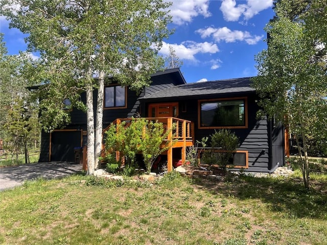 3 Miners Creek Rd, Frisco, CO 80443 - view of front of property featuring an attached garage, concrete driveway, and a deck