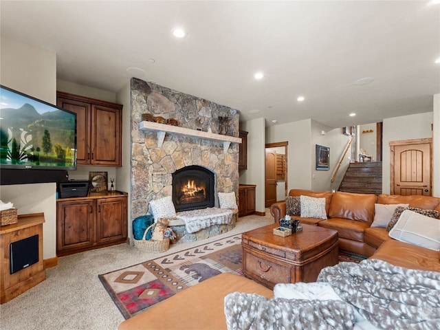 585 Independence Rd, Keystone, CO 80435 - living area featuring a stone fireplace, light carpet, stairway, recessed lighting, and baseboards