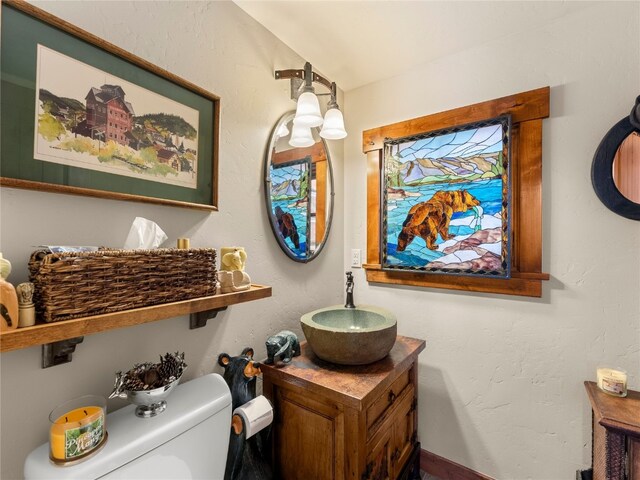 585 Independence Rd, Keystone, CO 80435 - half bathroom featuring toilet and vanity