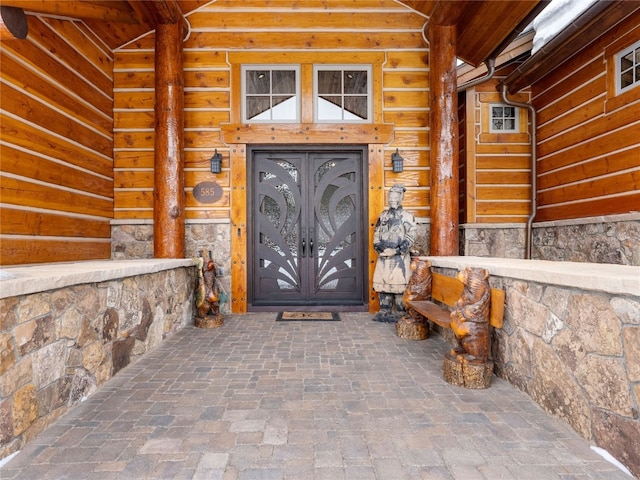 585 Independence Rd, Keystone, CO 80435 - doorway to property featuring stone siding and french doors