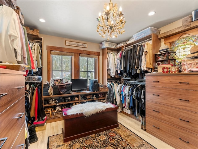 585 Independence Rd, Keystone, CO 80435 - spacious closet featuring a chandelier and light wood-style flooring